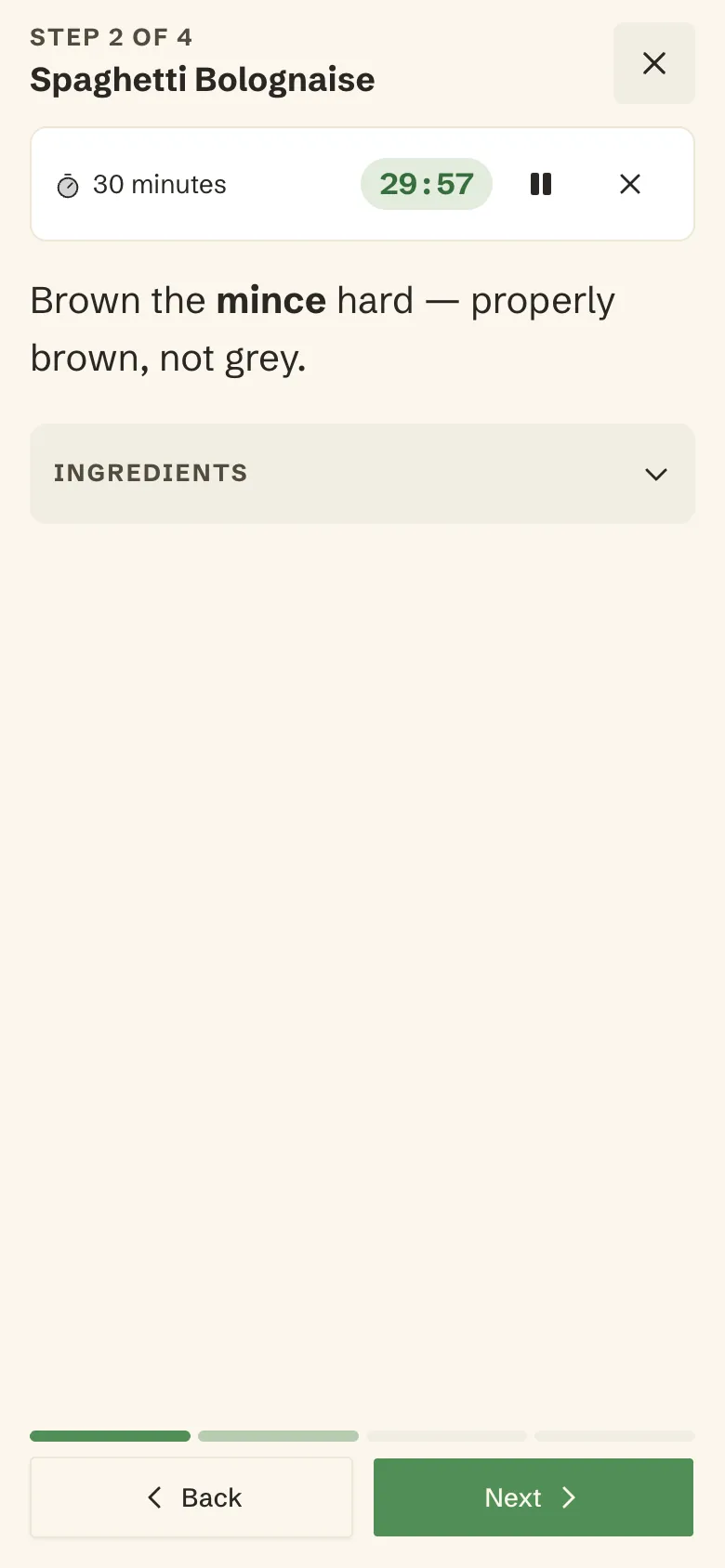 Cook mode on a phone, step 2 of 4 of spaghetti bolognaise, with a 30-minute timer counting down at the top