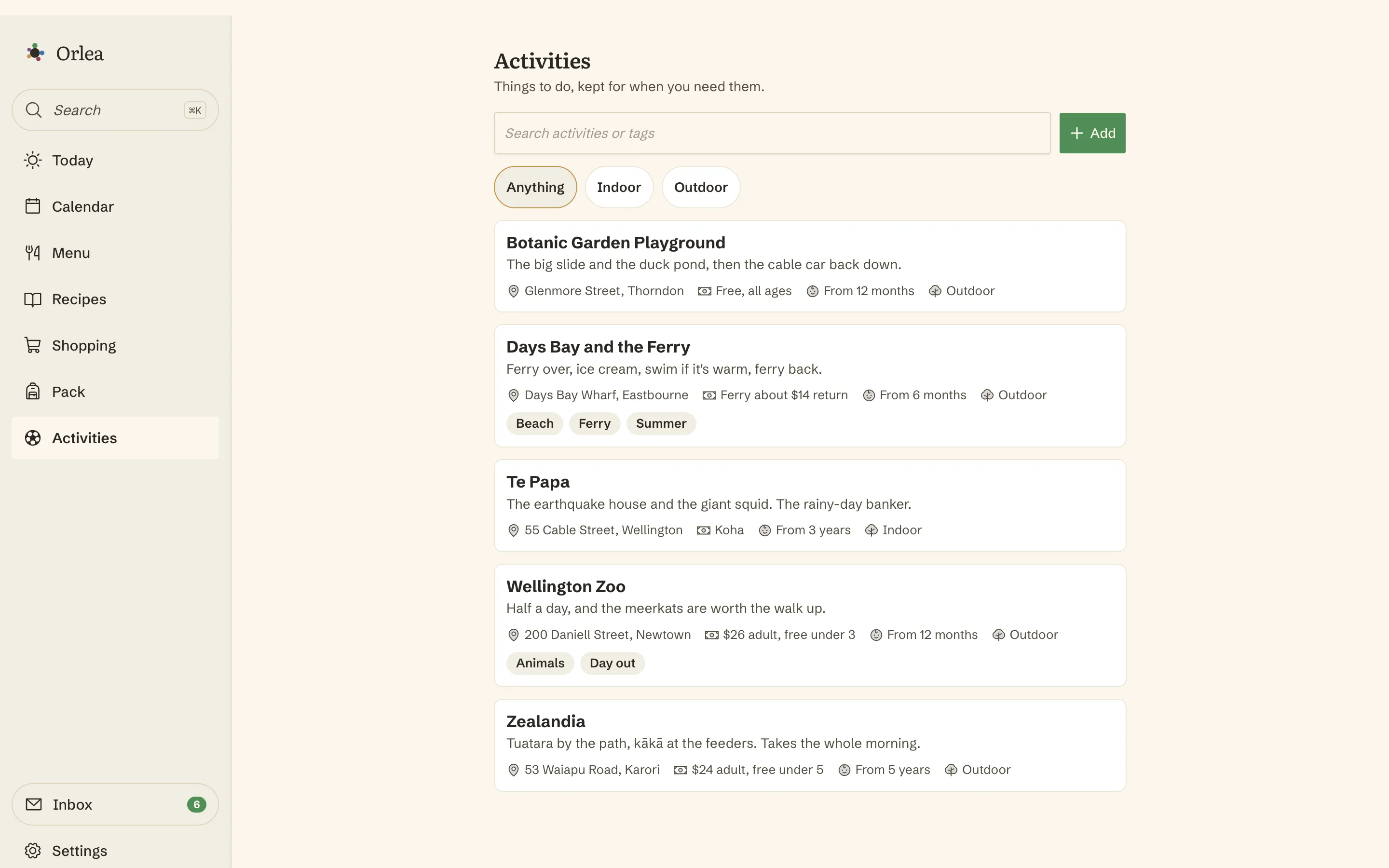The activity library: Botanic Garden playground, Days Bay and the ferry, Te Papa, Wellington Zoo and Zealandia, each card showing where it is, what it costs in plain words like koha or free under 3, and the ages it suits
